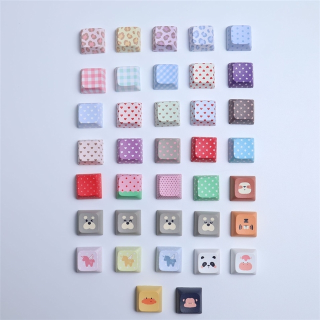 Wholesale Customizable 35pcs Kawaii Pattern Keycaps Leopard Hearts Stars Animal Face PBT/Paper Promotional Use OEM Set