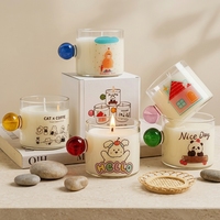Bougie en verre mignonne de style dessin animé avec poignée colorée, bougies parfumées en cire de soja faites à la main pour la décoration de la maison, coffret cadeau en gros