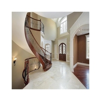 Escalier courbé élégant en acier au carbone avec finition thermolaquée pour appartement duplex