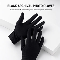 Gants photo d'archives Gants de travail noirs Gants en tissu Doublures en vrac pour la manipulation de bijoux, de films, de photos, d'inspection de pièces de monnaie