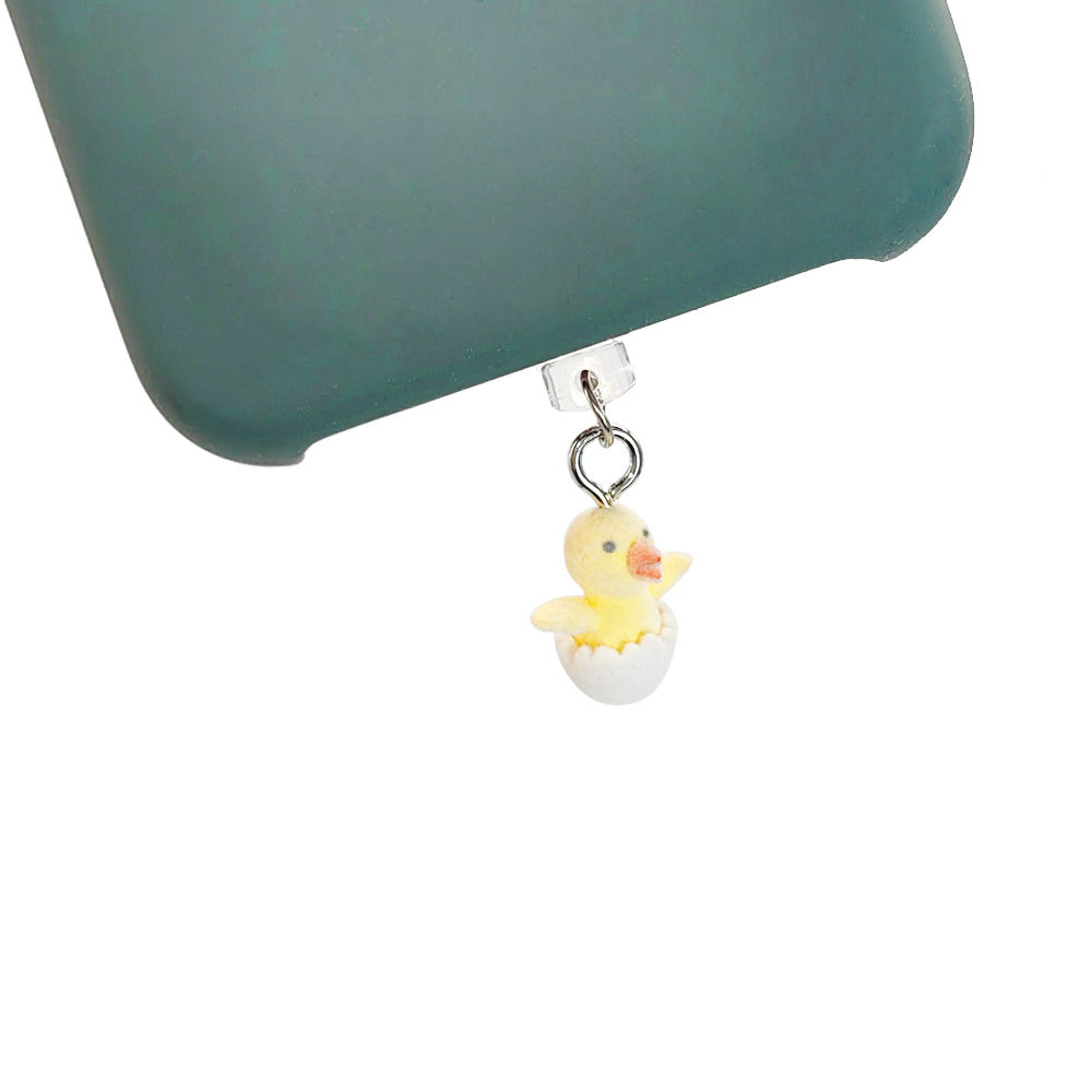 Poussin coquille d'oeuf