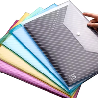 Ventas directas de fábrica Botón multicolor Bolsa de archivo de plástico Claro Transparente Impermeable 18C Carpeta de archivos Tamaño A4