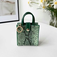 Nouvelle pochette à monnaie en cuir PU, nouveau sac pendentif, étuis à rouge à lèvres, sac pour écouteurs et clés de voiture, mini porte-monnaie, porte-clés en cuir