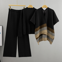 Ensemble décontracté trois pièces pour femme printemps-automne : cardigan ample, pull col roulé et pantalon large