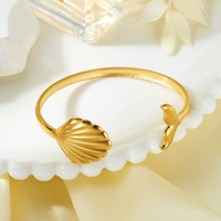 Bracelet manchette CUMAI Étoile de mer et coquillage en acier inoxydable plaqué or, ajustable, pour femme, bijoux de plage et d'océan