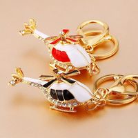 Porte-clés hélicoptère en métal de haute qualité, incrusté de cristaux 3D, thème aviation unique, cadeau souvenir, logo personnalisé