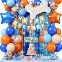 Ensemble de décorations de ballons d'anniversaire orange et bleu avec un topper de gâteau en forme de chien, un ballon en aluminium en forme d'os et d'étoile, et une bannière Joyeux Anniversaire