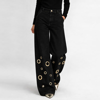 Pantalon en jean taille haute à jambes larges, boutonné, avec poches évidées, couleur unie