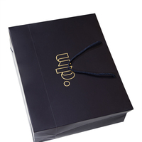 Sacs en papier noirs imprimés personnalisés, avec votre propre Logo, sachets d'emballage durs pour cadeaux et vêtements, avec poignées, 50 unités