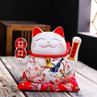 Mignon chat porte-bonheur en céramique blanche délicate et populaire Maneki Neko avec main ondulée pour la décoration intérieure de la boutique