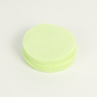 Tampon tonifiant vert coloré, semi-gel bleu, concept rafraîchissant, matière première sèche, tissu non-tissé