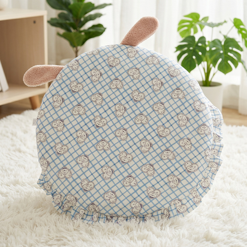 Grand coussinet rond à carreaux pour oreilles