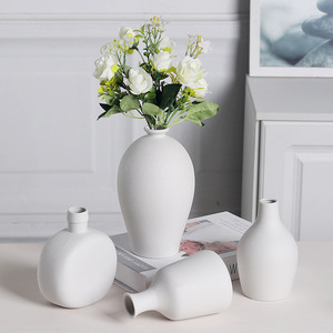 Vases miniatures nordiques en gros, ornements modernes minimalistes noir et blanc, luxe léger haut de gamme pour la décoration de la maison et du salon, <span class=keywords><strong>fleurs</strong></span> <span class=keywords><strong>séchées</strong></span> - Product Image 1