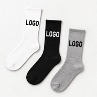 Chaussettes mi-mollet côtelées blanches personnalisées avec jacquard texte noir, chaussettes à logo personnalisé, chaussettes tricotées décontractées confortables à faible MOQ