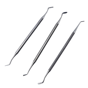 Instrumento de acero inoxidable de doble cabezal para relleno de cemento dental, equipo de limpieza y relleno de dientes, herramienta manual de clase II - Product Image 1