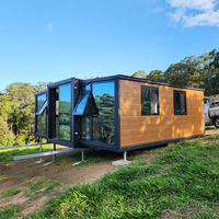 Maison conteneur extensible de 20 pieds, gris clair, avec terrasse blanche, préfabriquée modulaire, unité d'habitation autonome pour jardin arrière de maison au Royaume-Uni