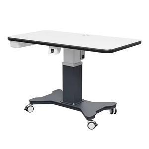 Elektrisch verstellbarer Tisch mit geräumiger Arbeitsfläche für Optometrie-Ausrüstung und ophthalmologische Instrumente. - Product Image 1