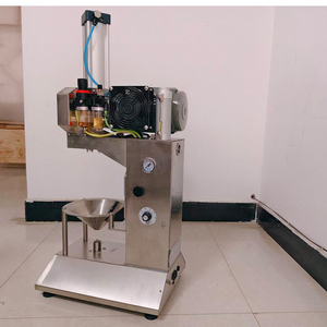 La última máquina automática para pelar y cortar cocos verdes se utiliza en fábricas y tiendas. - Product Image 3