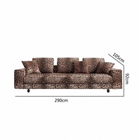 Canapé de luxe minimaliste avec tissu imprimé léopard moelleux et assise extra-large pour un salon élégant