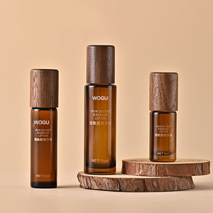 <span class=keywords><strong>Flacon</strong></span> roll-on vide en verre ambré <span class=keywords><strong>de</strong></span> 10 ml pour huile <span class=keywords><strong>de</strong></span> <span class=keywords><strong>parfum</strong></span>, petit et <span class=keywords><strong>portable</strong></span>, avec bouchon en noyer, personnalisable avec logo - Product Image 1