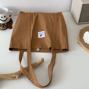 กระเป๋าโท้ทผ้าใบแคนวาสสำหรับช้อปปิ้งผ้าแคนวาสสีล้วนสไตล์ย้อนยุคโลโก้ที่กำหนดเอง - Product Image 4