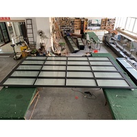 Dernier alliage d'aluminium + verre segmenté automatique porte de garage prix d'usine et moteur 2022