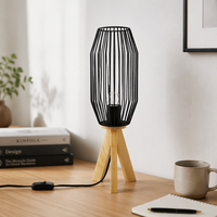 Lampu Meja Minimalis Modern Desain Baru untuk Ruang Tamu, Kamar Tidur, atau Ruang Kerja, dengan Desain Kandang Logam Hitam dan Lampu LED.