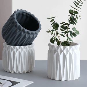 <span class=keywords><strong>Pot</strong></span> <span class=keywords><strong>de</strong></span> fleurs en ciment simple <span class=keywords><strong>de</strong></span> style nordique rond pour la décoration <span class=keywords><strong>de</strong></span> la maison - Product Image 3