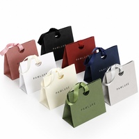 Sac d'exposition de luxe personnalisé avec logo, impression offset, découpe, texture, papier couché, durable, écologique, avec poignée en ruban