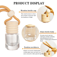 Bouteille en verre de désodorisant de voiture de parfum suspendu rond de forme de cylindre de Offre Spéciale 5ml avec le chapeau en bois
