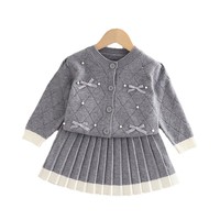 Nouvel ensemble jupe et haut tricoté style preppy pour filles, collection automne-hiver, avec nœud papillon pour enfants