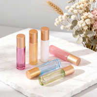 Vente en gros de flacons à bille en verre translucide coloré de 10 ml, flacons vides pour huiles parfumées, couleurs assorties pour l'identification des senteurs