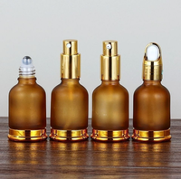 Flacons compte-gouttes en verre électroplaqué or et argent sur mesure avec pipette à bulbe en caoutchouc pour emballage cosmétique d'huiles essentielles et sérums