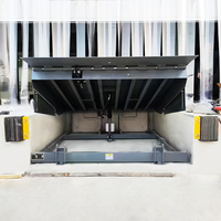 Plateforme de chargement hydraulique fixe industrielle avec rebord anti-collision pour déchargement de conteneurs de camions