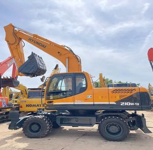 Excavatrice sur pneus HYUNDAI 210W-7 210W-9 en très bon état 21 tonnes d'occasion, marque coréenne originale de renommée mondiale, bon moteur - Product Image 1