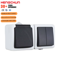 Interruptor de botón a prueba de agua IP54 1 Gang 2 Gang Enchufe de pared estándar europeo Material de PC ABS de alta calidad para exteriores