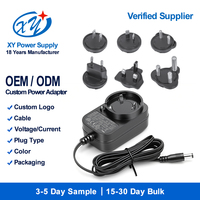 Adaptateur mural interchangeable certifié SAA ETL CE, prise CA 100-240V vers 12V 2A 24W, alimentation SELV, sortie d'usine