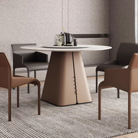 Moderner leichter Luxus-runder Tisch Minimalisti scher Stil Familie Kleine flache Fels platte mit Plattenspieler Sattel leder Esstisch