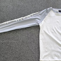 T-shirt à manches longues col rond raglan avec étiquette tissée, imprimé bouffant uni, grande taille, 100 % coton, avec coutures