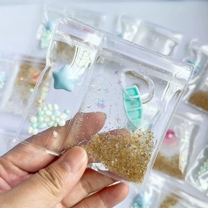 CHENXI Jouet créatif anti-stress en forme de poisson rouge en gelée à pincer, pendentif DIY pour sac d'école - Product Image 1