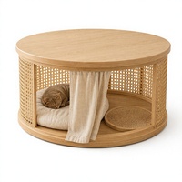 Table basse ronde en bois et rotin tressé avec niche pour chat, idéale pour le salon, conçue pour une utilisation partagée entre les humains et les animaux domestiques