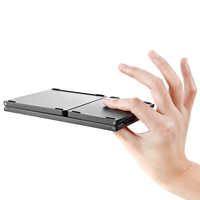 B033 Mini Folding 2.4Ghz Wireless Ergonomic Scissor Switch Keyboard USB-C Rechargeable Plastic Touch Pad Laptop Tablet Mobile