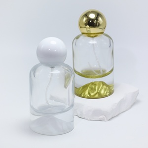 Bouteilles de parfum cylindriques en verre OEM/ODM 30ml 50ml 100ml avec fonds sérigraphiés or/argent/bleu/rouge/vert et pulvérisateur à pompe pour cadeau - Product Image 5