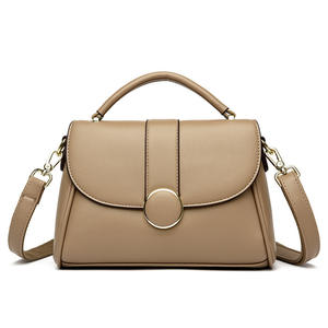 À la mode grande capacité doux PU matériel étanche femmes décontracté fourre-tout sac à main fermeture éclair couleur unie conception Simple personnalisé ODM - Product Image 1
