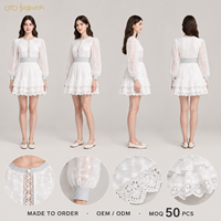 Robe Courte Blanche Femme à Manches Bouffantes, Dentelle Broderie Anglaise, Ourlet Volanté Superposé, Idéale pour Rendez-vous Romantique, Fabricant OEM Personnalisé
