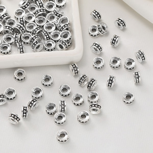Cuentas espaciadoras de plata tibetana, planas y redondas, chapadas en aleación de zinc, para la fabricación de pulseras - Product Image 1