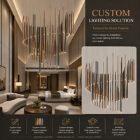 Lustre LED cylindrique minimaliste en acier inoxydable OEM, lampe de plafond multi-brins pour l'éclairage des projets hôteliers, chambres d'hôtes et villas