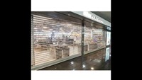 Rideau de magasin antivol de centre commercial Portes coulissantes transparentes et horizontales en acier inoxydable