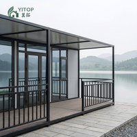 Maison pliable à montage simple avec terrasse et balustrades, revêtement extérieur personnalisé, maison conteneur extensible à toit plat pour le glamping