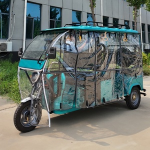 Tricycle électrique pour passagers avec rideaux latéraux transparents, porte-bagages, siège banquette et repose-pieds pour navette hôtelière - Product Image 5